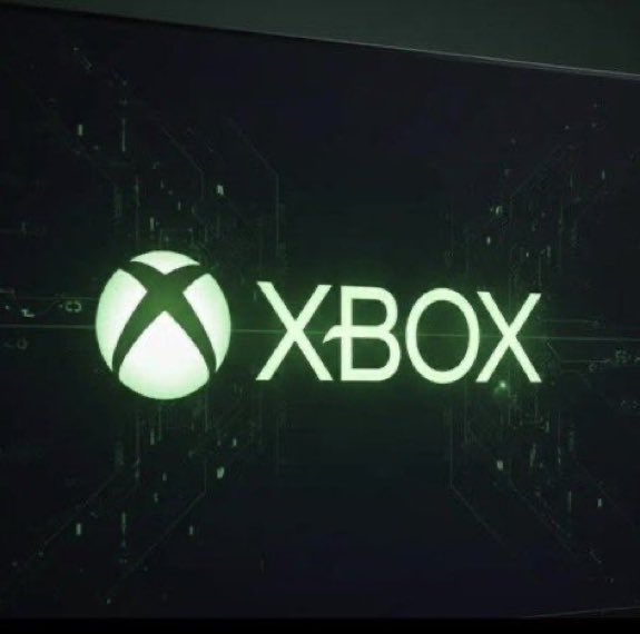 The Xbox logo glowing green on a dark background